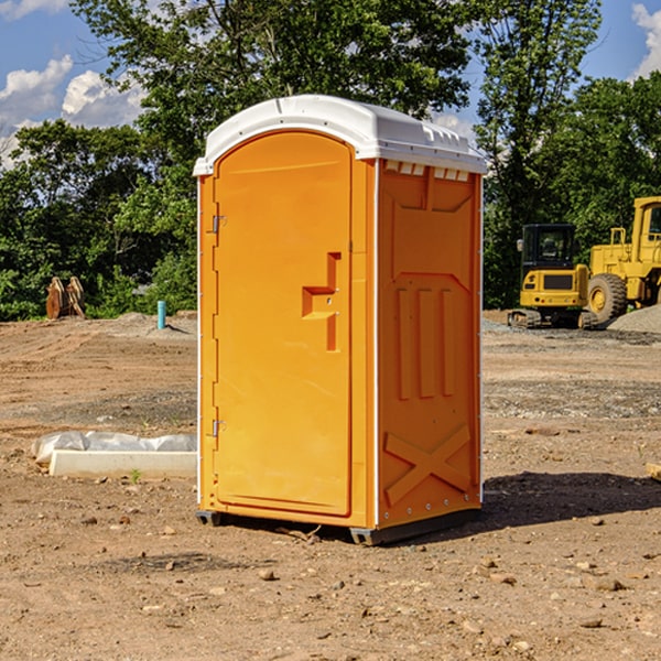 what is the cost difference between standard and deluxe portable toilet rentals in Lesterville